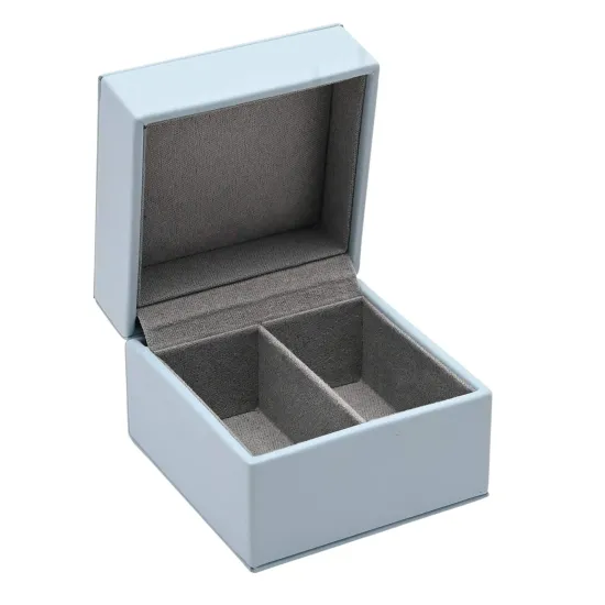 Cutie de amintiri pentru șuviță și dințișor Bambino by Juliana, culoare bleu, cu interior catifelat gri și două compartimente.