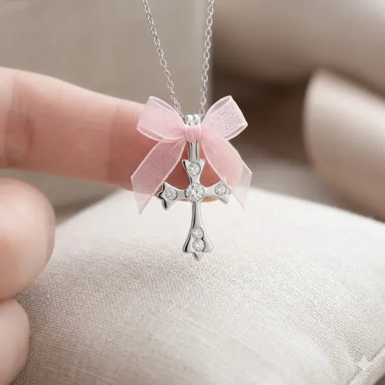 Cruciulita botez argintie fundita roz organza si strasuri